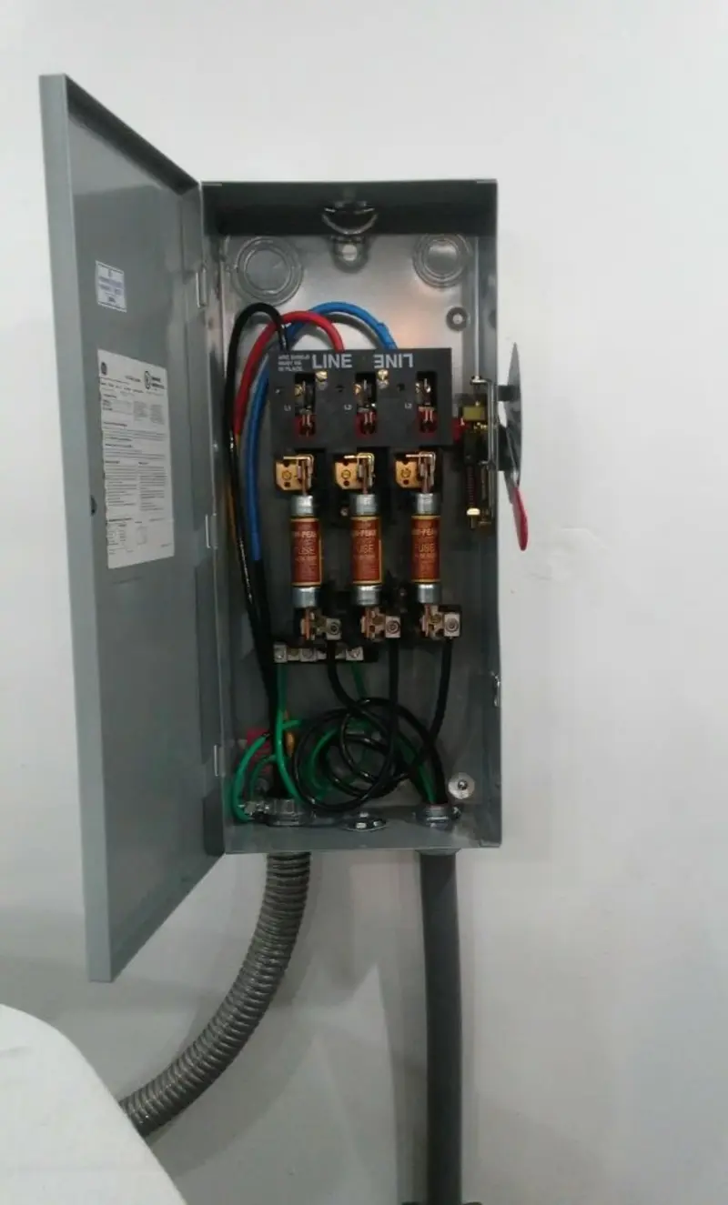 Three-phase disconnect switch installed for Smoke Detector Installation in Essexville