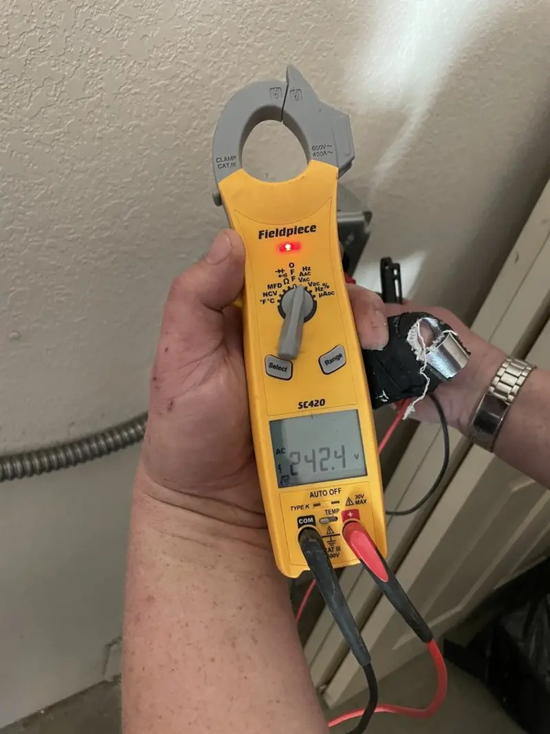 Voltage testing with clamp meter during Generator Installation in Essexville